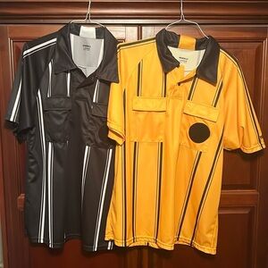 Bundle of 2 official soccer referee jerseys.